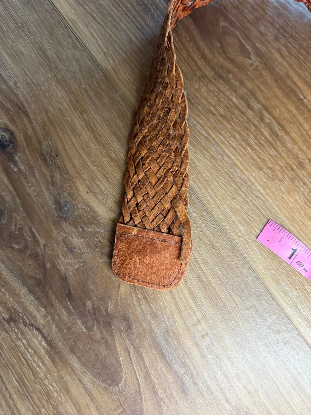 Handwoven Brown Leather Belt with Decorative Silver Buckle